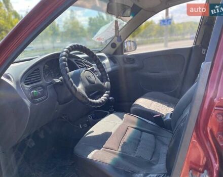 Красный Дэу Ланос, объемом двигателя 1.5 л и пробегом 200 тыс. км за 2400 $, фото 5 на Automoto.ua