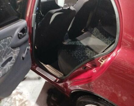 Красный Дэу Ланос, объемом двигателя 1.5 л и пробегом 200 тыс. км за 2250 $, фото 5 на Automoto.ua