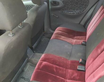 Червоний Деу Ланос, об'ємом двигуна 1.5 л та пробігом 208 тис. км за 1200 $, фото 8 на Automoto.ua