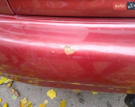 Красный Дэу Ланос, объемом двигателя 1.5 л и пробегом 320 тыс. км за 2300 $, фото 3 на Automoto.ua