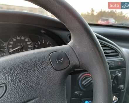 Червоний Деу Ланос, об'ємом двигуна 1.6 л та пробігом 240 тис. км за 2999 $, фото 13 на Automoto.ua