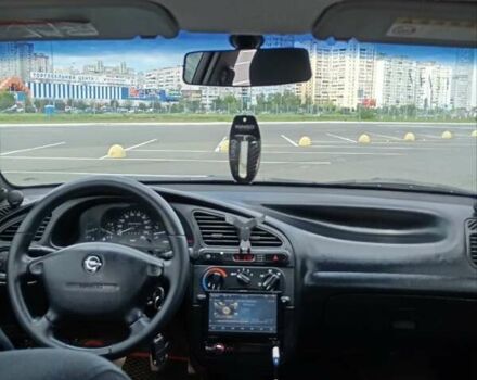 Красный Дэу Ланос, объемом двигателя 1.5 л и пробегом 390 тыс. км за 2399 $, фото 10 на Automoto.ua