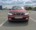 Красный Дэу Ланос, объемом двигателя 1.5 л и пробегом 390 тыс. км за 2399 $, фото 1 на Automoto.ua