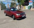 Красный Дэу Ланос, объемом двигателя 1.5 л и пробегом 200 тыс. км за 2400 $, фото 1 на Automoto.ua