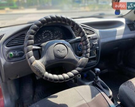 Красный Дэу Ланос, объемом двигателя 1.5 л и пробегом 200 тыс. км за 2400 $, фото 6 на Automoto.ua