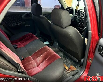 Червоний Деу Ланос, об'ємом двигуна 1.5 л та пробігом 208 тис. км за 1900 $, фото 10 на Automoto.ua