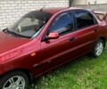 Красный Дэу Ланос, объемом двигателя 1.5 л и пробегом 102 тыс. км за 3150 $, фото 1 на Automoto.ua