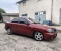 Красный Дэу Ланос, объемом двигателя 1.5 л и пробегом 151 тыс. км за 2650 $, фото 1 на Automoto.ua