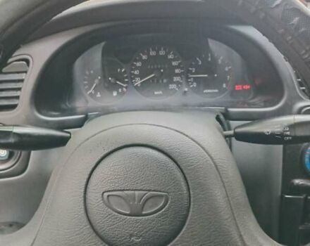 Красный Дэу Ланос, объемом двигателя 1.5 л и пробегом 320 тыс. км за 2300 $, фото 6 на Automoto.ua