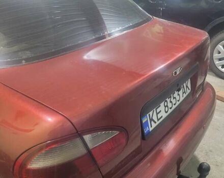 Красный Дэу Ланос, объемом двигателя 1.6 л и пробегом 255 тыс. км за 2000 $, фото 4 на Automoto.ua