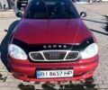 Красный Дэу Ланос, объемом двигателя 1.5 л и пробегом 205 тыс. км за 2700 $, фото 1 на Automoto.ua