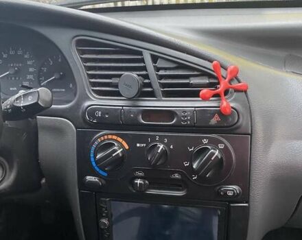 Красный Дэу Ланос, объемом двигателя 1.6 л и пробегом 297 тыс. км за 2500 $, фото 6 на Automoto.ua