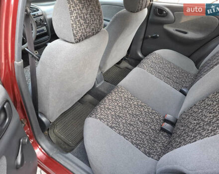 Красный Дэу Ланос, объемом двигателя 1.5 л и пробегом 228 тыс. км за 2999 $, фото 7 на Automoto.ua