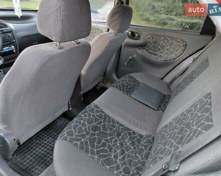 Червоний Деу Ланос, об'ємом двигуна 1.6 л та пробігом 240 тис. км за 2999 $, фото 10 на Automoto.ua