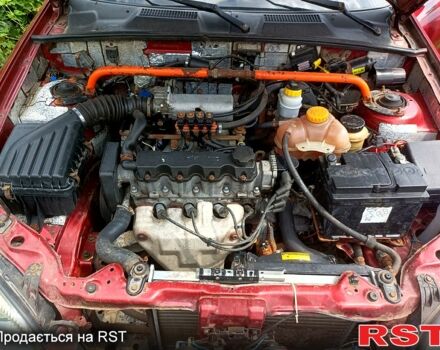 Деу Ланос 2004 у Мерефа на Automoto.ua Червоний Деу Ланос, об'ємом двигуна 1.5 л та пробігом 400 тис. км за 2200 $, фото 9 на Automoto.ua