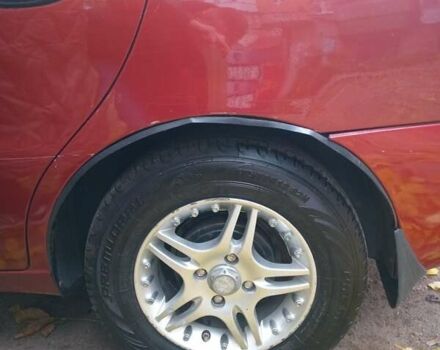 Красный Дэу Ланос, объемом двигателя 1.5 л и пробегом 320 тыс. км за 2300 $, фото 2 на Automoto.ua