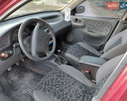 Червоний Деу Ланос, об'ємом двигуна 1.6 л та пробігом 240 тис. км за 2999 $, фото 5 на Automoto.ua