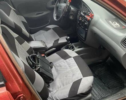 Красный Дэу Ланос, объемом двигателя 1.6 л и пробегом 297 тыс. км за 2500 $, фото 8 на Automoto.ua