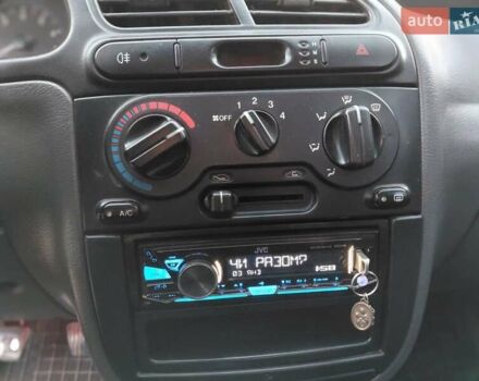 Червоний Деу Ланос, об'ємом двигуна 1.6 л та пробігом 240 тис. км за 2999 $, фото 11 на Automoto.ua