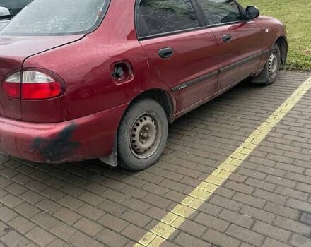 Красный Дэу Ланос, объемом двигателя 1.35 л и пробегом 180 тыс. км за 950 $, фото 2 на Automoto.ua