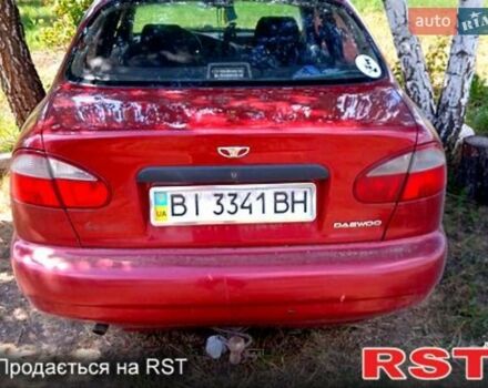 Красный Дэу Ланос, объемом двигателя 1.5 л и пробегом 280 тыс. км за 1900 $, фото 3 на Automoto.ua