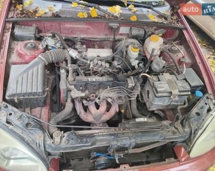 Красный Дэу Ланос, объемом двигателя 1.5 л и пробегом 320 тыс. км за 2300 $, фото 55 на Automoto.ua