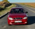 Красный Дэу Ланос, объемом двигателя 1.3 л и пробегом 205 тыс. км за 2100 $, фото 1 на Automoto.ua