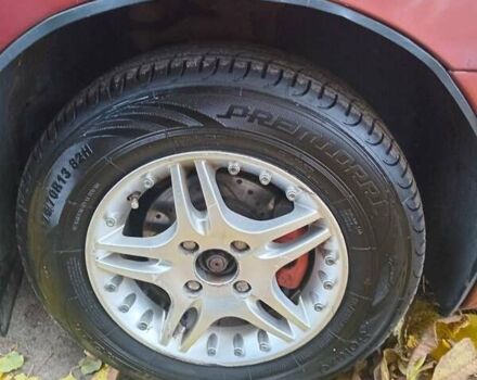 Красный Дэу Ланос, объемом двигателя 1.5 л и пробегом 320 тыс. км за 2300 $, фото 7 на Automoto.ua