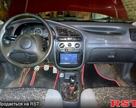 Деу Ланос 2004 у Мерефа на Automoto.ua Червоний Деу Ланос, об'ємом двигуна 1.5 л та пробігом 400 тис. км за 2200 $, фото 6 на Automoto.ua