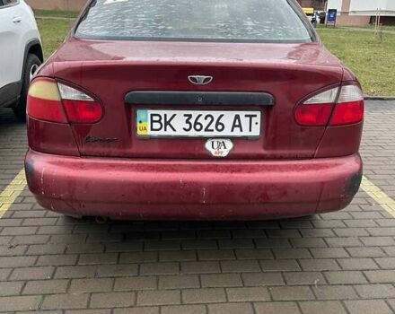 Красный Дэу Ланос, объемом двигателя 1.35 л и пробегом 180 тыс. км за 950 $, фото 1 на Automoto.ua