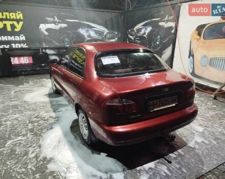 Красный Дэу Ланос, объемом двигателя 1.5 л и пробегом 200 тыс. км за 2250 $, фото 2 на Automoto.ua