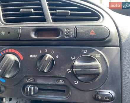 Красный Дэу Ланос, объемом двигателя 1.5 л и пробегом 200 тыс. км за 2400 $, фото 7 на Automoto.ua