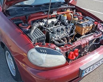 Красный Дэу Ланос, объемом двигателя 1.5 л и пробегом 390 тыс. км за 2399 $, фото 13 на Automoto.ua