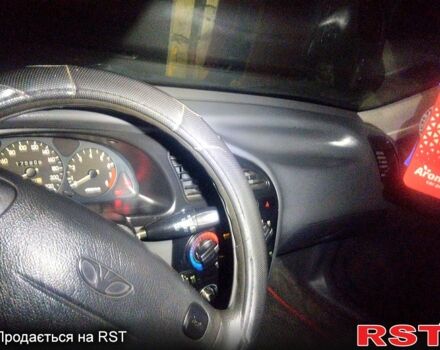 Червоний Деу Ланос, об'ємом двигуна 1.6 л та пробігом 175 тис. км за 2500 $, фото 4 на Automoto.ua