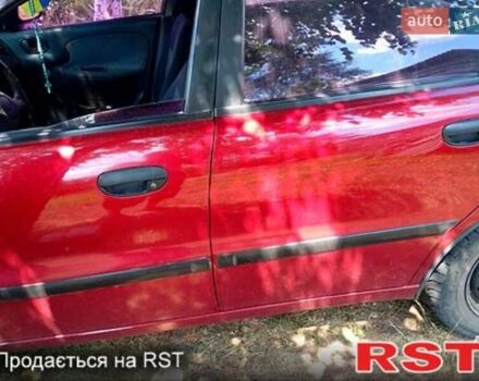 Красный Дэу Ланос, объемом двигателя 1.5 л и пробегом 280 тыс. км за 1900 $, фото 4 на Automoto.ua