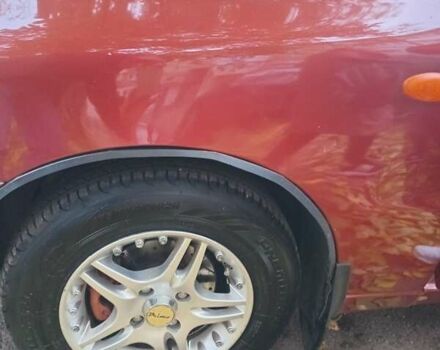 Красный Дэу Ланос, объемом двигателя 1.5 л и пробегом 320 тыс. км за 2300 $, фото 5 на Automoto.ua