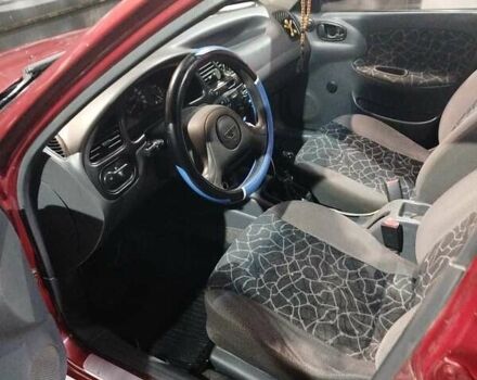 Красный Дэу Ланос, объемом двигателя 1.5 л и пробегом 200 тыс. км за 2250 $, фото 6 на Automoto.ua