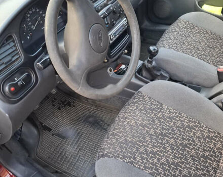 Красный Дэу Ланос, объемом двигателя 1.5 л и пробегом 228 тыс. км за 2999 $, фото 5 на Automoto.ua