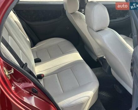 Красный Дэу Ланос, объемом двигателя 1.6 л и пробегом 219 тыс. км за 2900 $, фото 16 на Automoto.ua