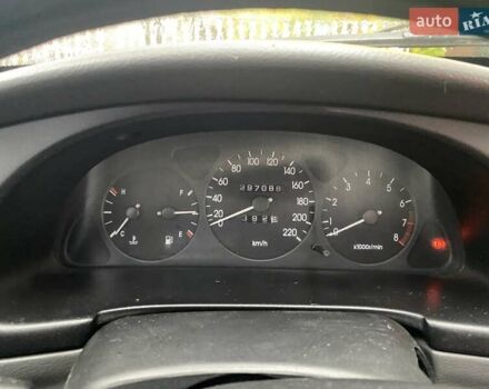 Красный Дэу Ланос, объемом двигателя 1.6 л и пробегом 297 тыс. км за 2500 $, фото 5 на Automoto.ua