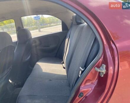 Красный Дэу Ланос, объемом двигателя 1.5 л и пробегом 200 тыс. км за 2400 $, фото 9 на Automoto.ua