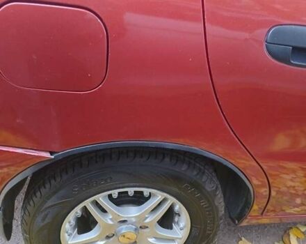 Красный Дэу Ланос, объемом двигателя 1.5 л и пробегом 320 тыс. км за 2300 $, фото 4 на Automoto.ua