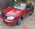 Красный Дэу Ланос, объемом двигателя 1.5 л и пробегом 157 тыс. км за 2250 $, фото 1 на Automoto.ua