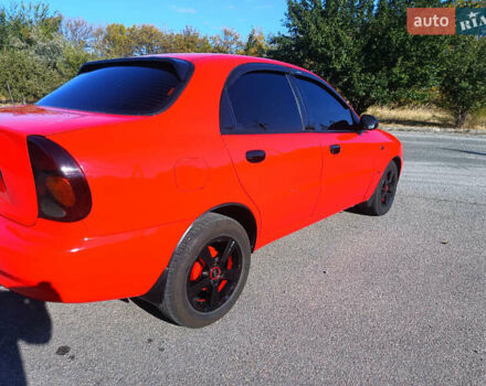 Красный Дэу Ланос, объемом двигателя 1.6 л и пробегом 187 тыс. км за 3150 $, фото 4 на Automoto.ua