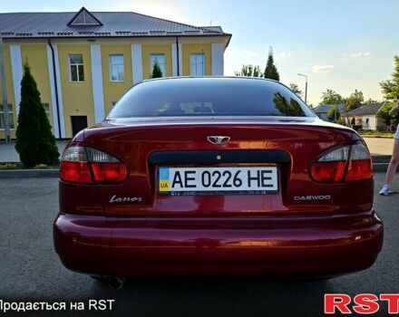 Красный Дэу Ланос, объемом двигателя 1.5 л и пробегом 165 тыс. км за 2100 $, фото 2 на Automoto.ua