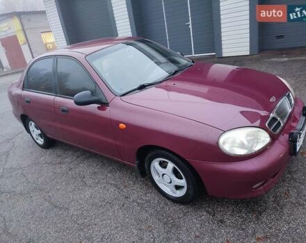 Красный Дэу Ланос, объемом двигателя 1.6 л и пробегом 244 тыс. км за 2850 $, фото 9 на Automoto.ua