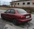 Красный Дэу Ланос, объемом двигателя 1.5 л и пробегом 245 тыс. км за 1650 $, фото 20 на Automoto.ua