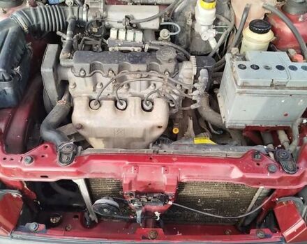 Красный Дэу Ланос, объемом двигателя 1.5 л и пробегом 216 тыс. км за 2500 $, фото 8 на Automoto.ua