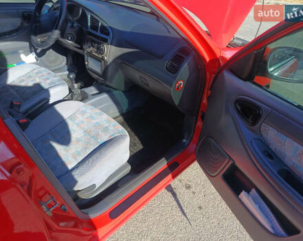 Красный Дэу Ланос, объемом двигателя 1.6 л и пробегом 187 тыс. км за 3150 $, фото 9 на Automoto.ua