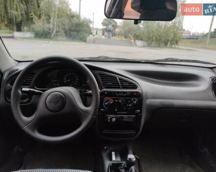 Красный Дэу Ланос, объемом двигателя 1.5 л и пробегом 102 тыс. км за 2500 $, фото 6 на Automoto.ua